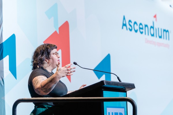 Woman speaking at a podium