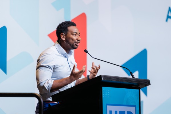 Man talking at a podium
